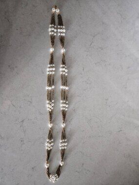 RARE AND VINTAGE GOLD AND PEARL SIX STRAND 52" LONG NECKLACE IN CHANEL STYLE